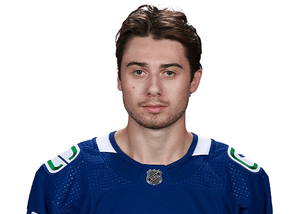 Quinn Hughes's headshot.